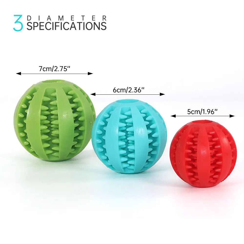 dog chewing ball